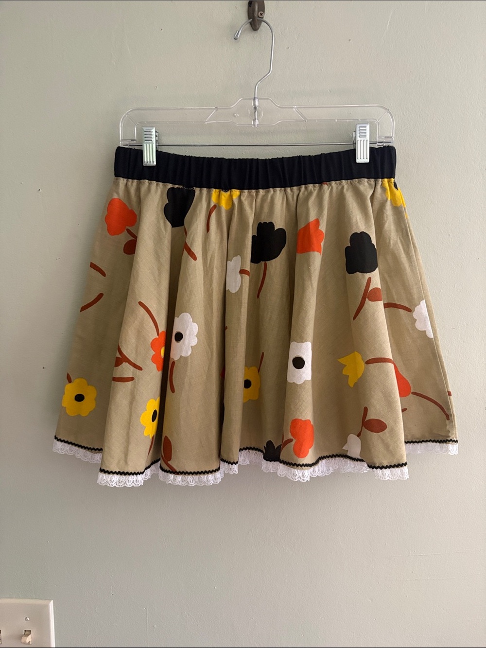 She’s so pretty Floral Circle Skirt with Black Waistband in Khaki M